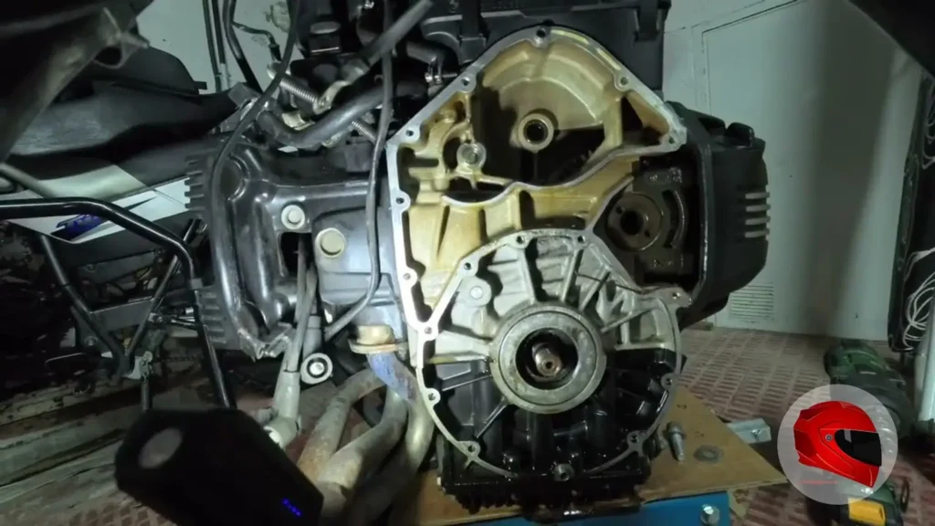 BMW K75 engine opened up showing the clutch and intermediate housing during maintenance