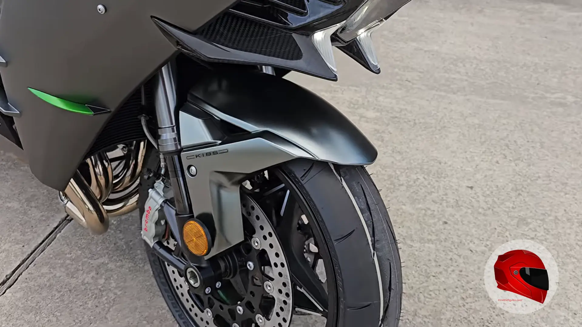 Close-up of a superbike front brake disc and Brembo caliper