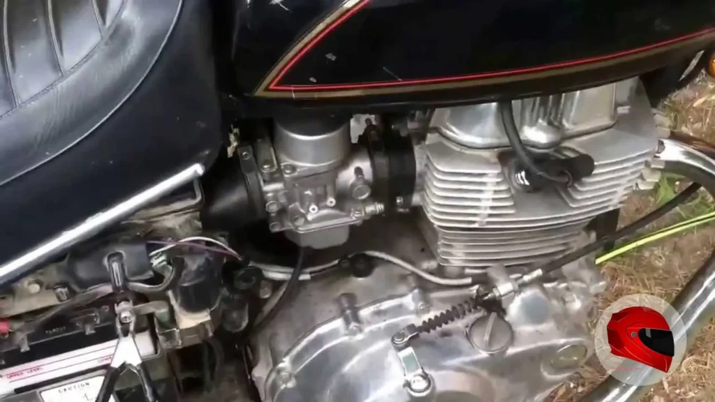 Close view of Honda CM400 twin-cylinder engine and carburetors