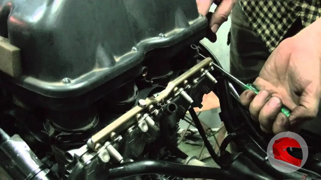 Hands-on workshop view of a Yamaha XJ600 engine and airbox during maintenance