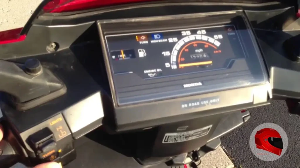 Honda CH80 Elite 80 instrument cluster with speedometer and fuel gauge