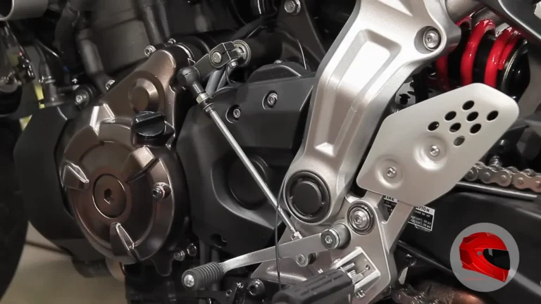 Motorcycle gear shift lever and quickshifter linkage close-up