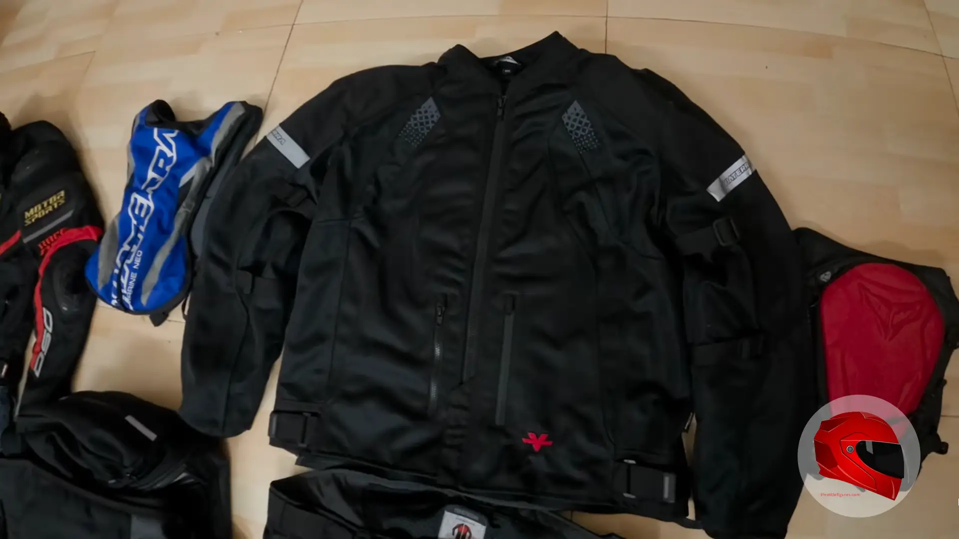 Motorcycle riding jacket and protective gear laid out