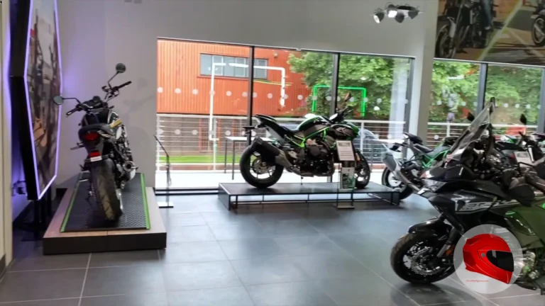 New Kawasaki motorcycles on display in a dealership showroom