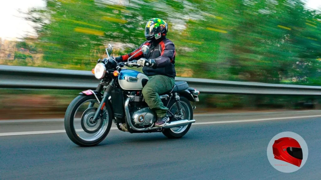 Triumph Bonneville T100 being ridden on the highway